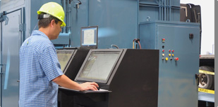 Man calibrating CPC on a composites oven