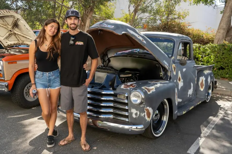 A couple with their restored pickup truck at the ASC car show