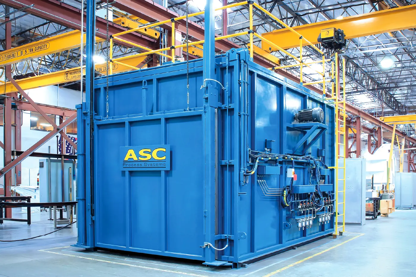 An ASC walk-in composite curing oven with its piping and vacuum lines