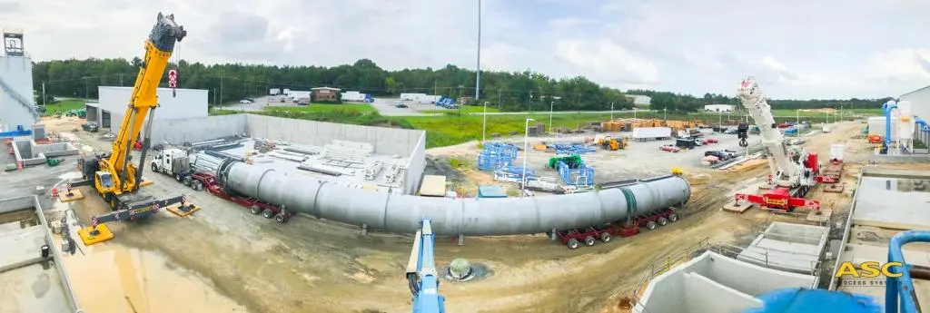 A crane setting a 150 ft ASC AAC autoclave into its pit at the customer's plant