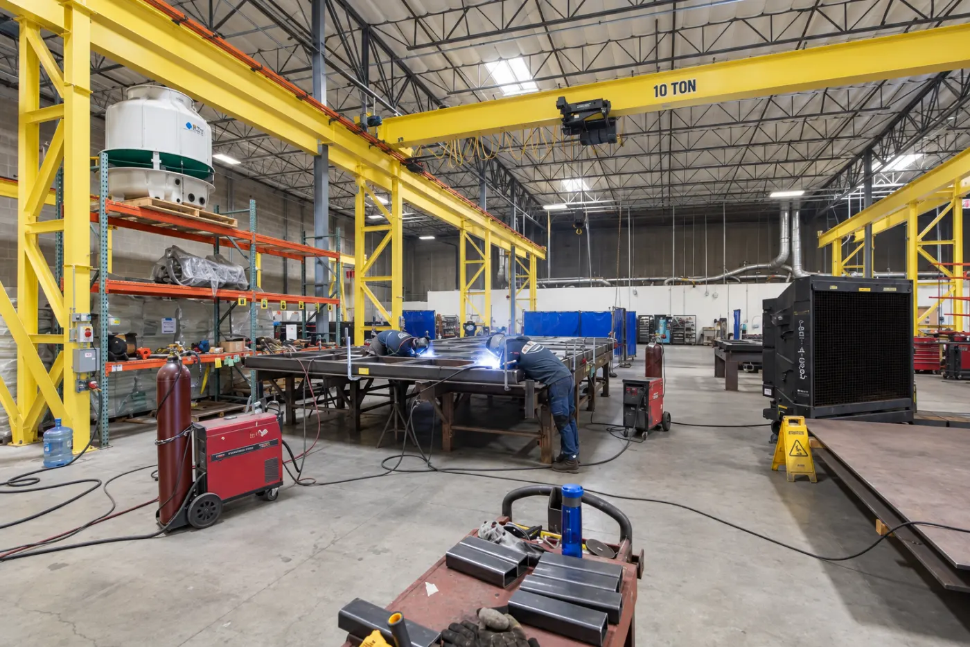 A high bay in ASC's Valencia plant with overhead bridge cranes