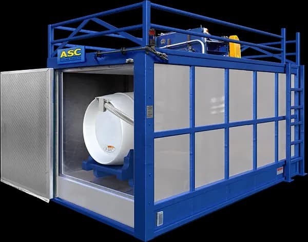 An ASC hot box with its door open and a UF₆ cylinder inside