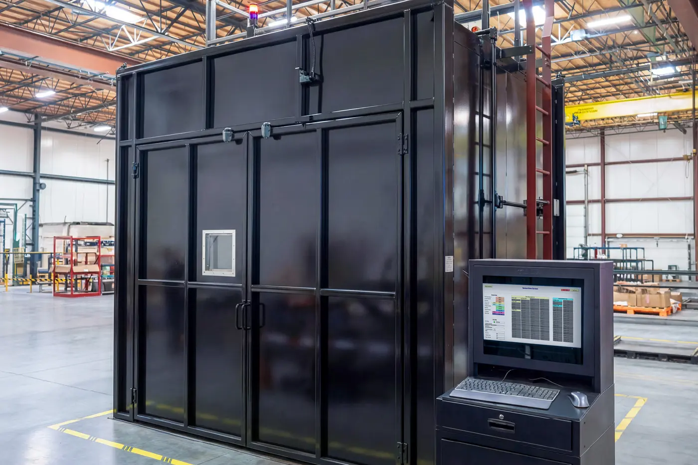 An ASC composite curing oven with its CPC operator station beside the doors